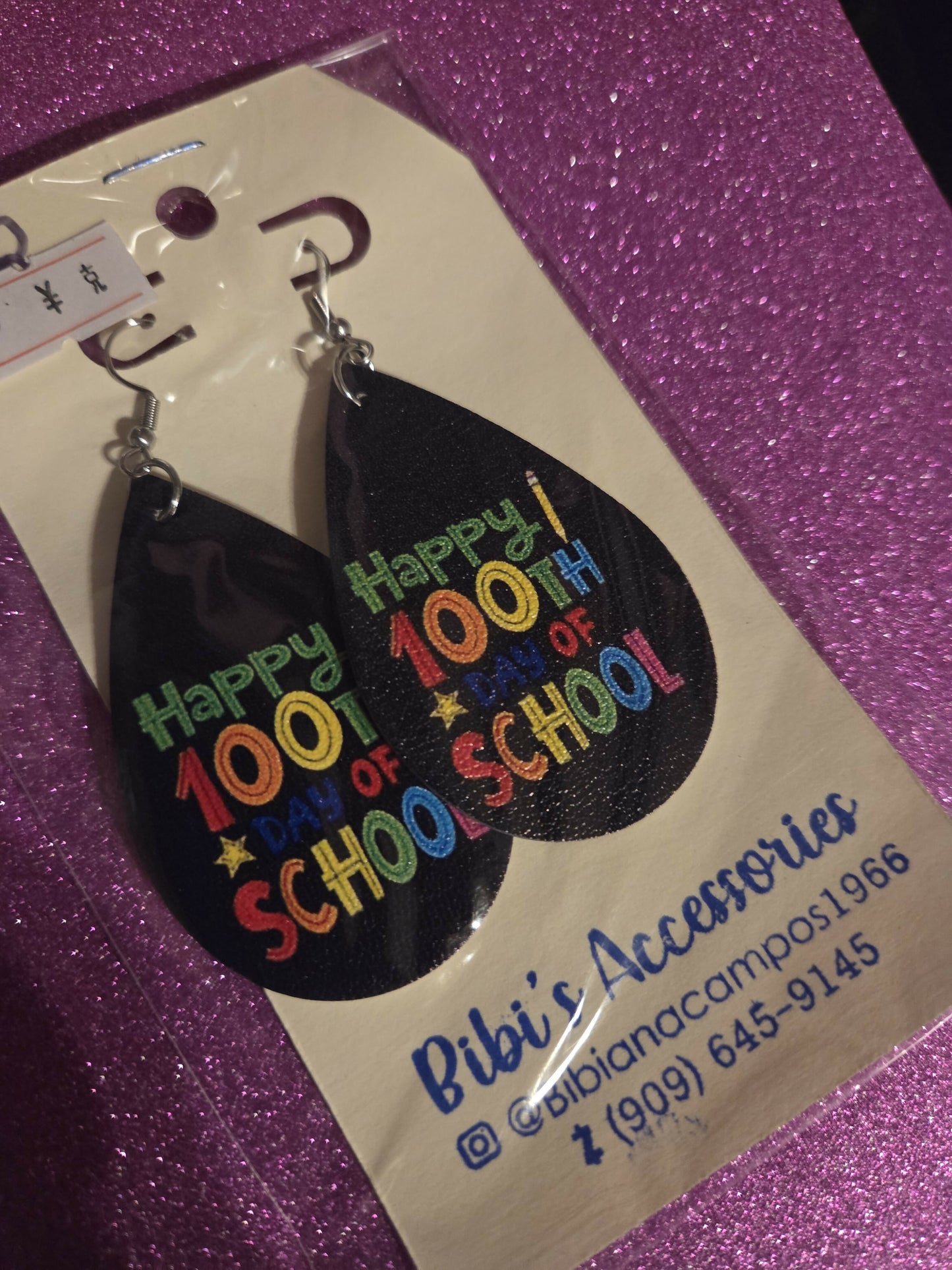 Aretes maestra 100 dias de escula