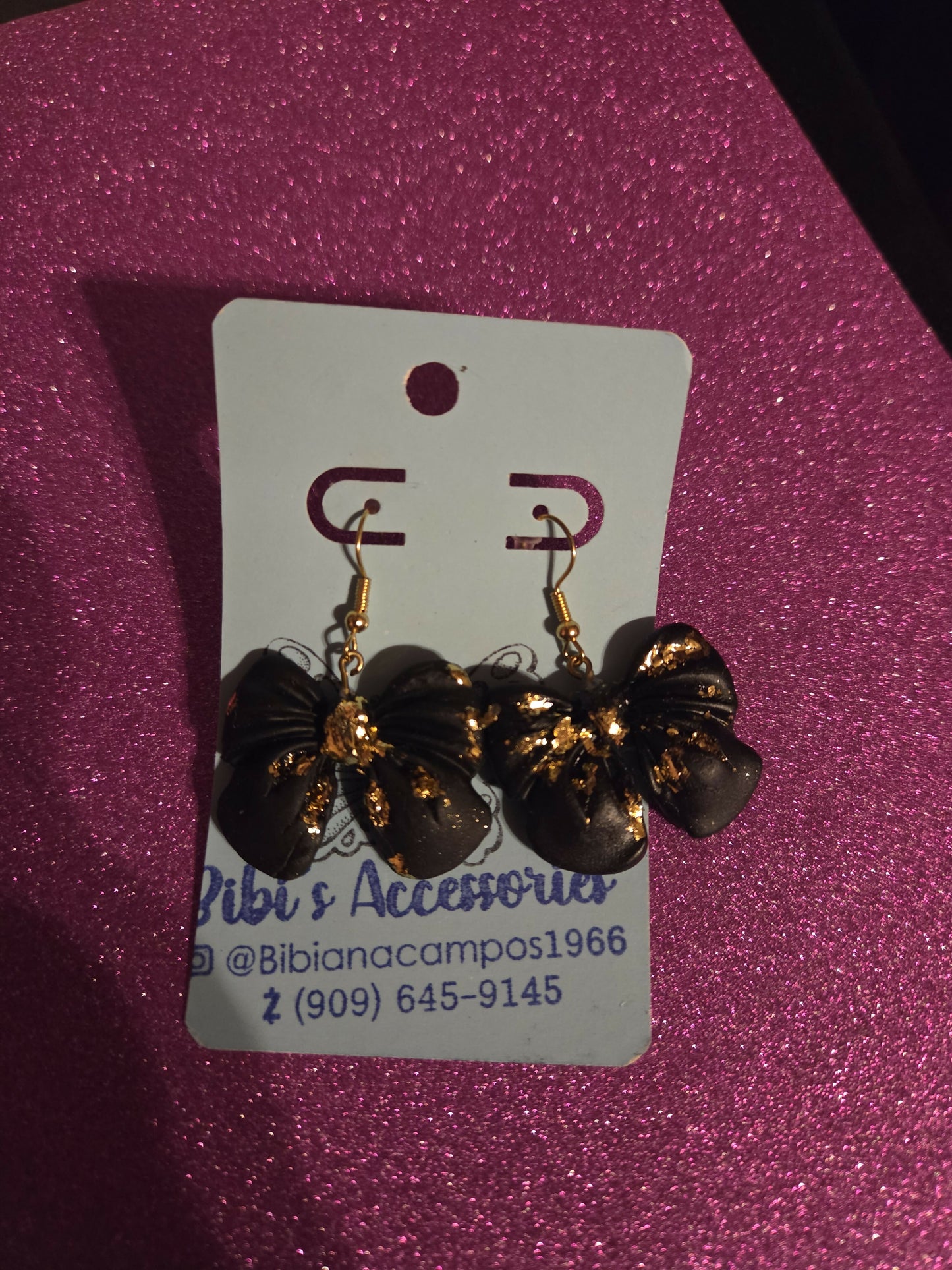 Aretes negros gold bow