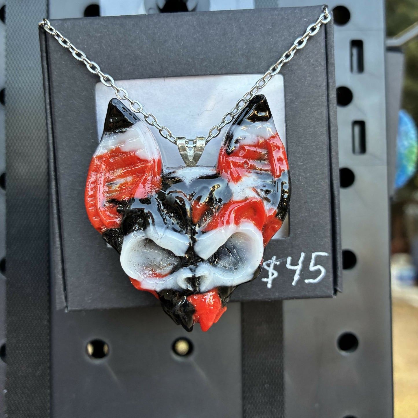 Red black and white bat head