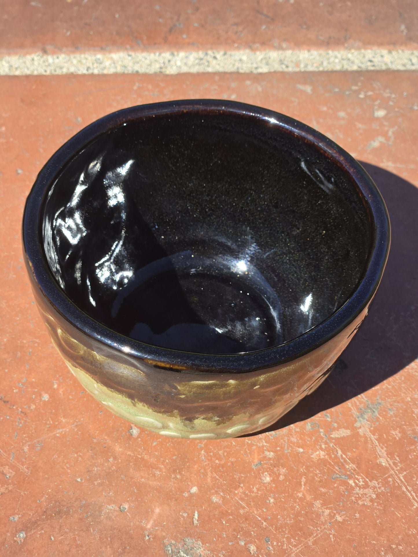 Black and green textured bowl