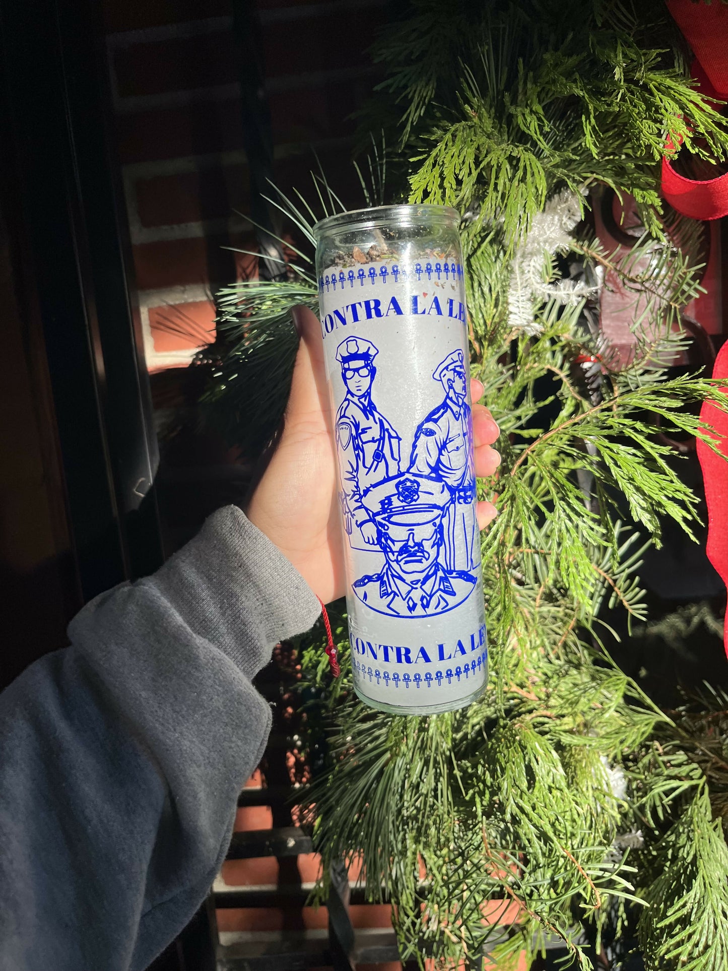 Contra La Ley Candle