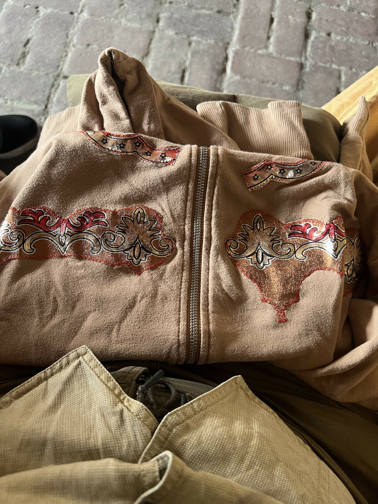 Vinyl tan sweater