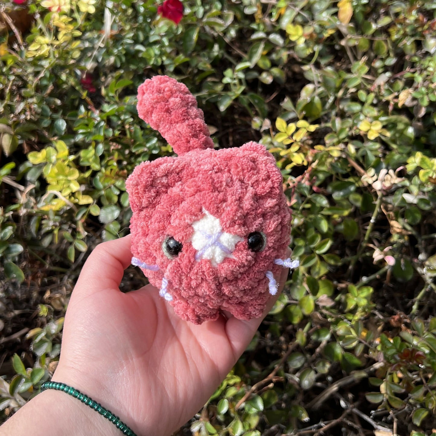 Crocheted pink kitten