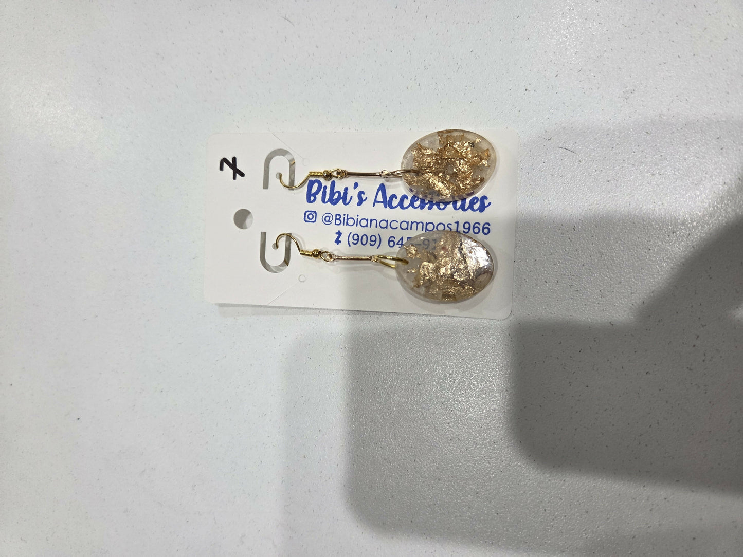 Aretes resina con papel oro