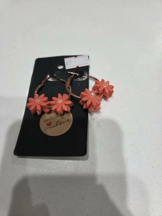 Atetes flor arracada con piedra