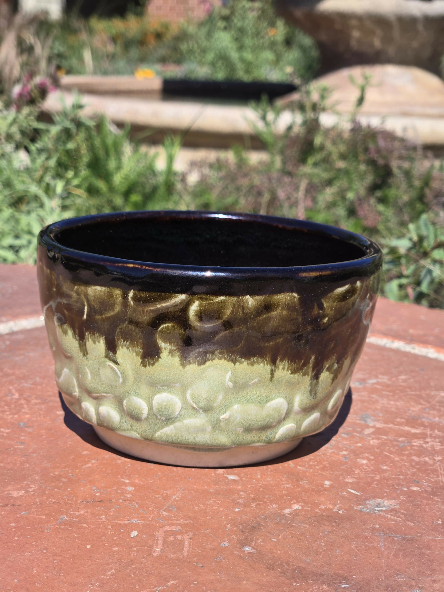 Black and green textured bowl