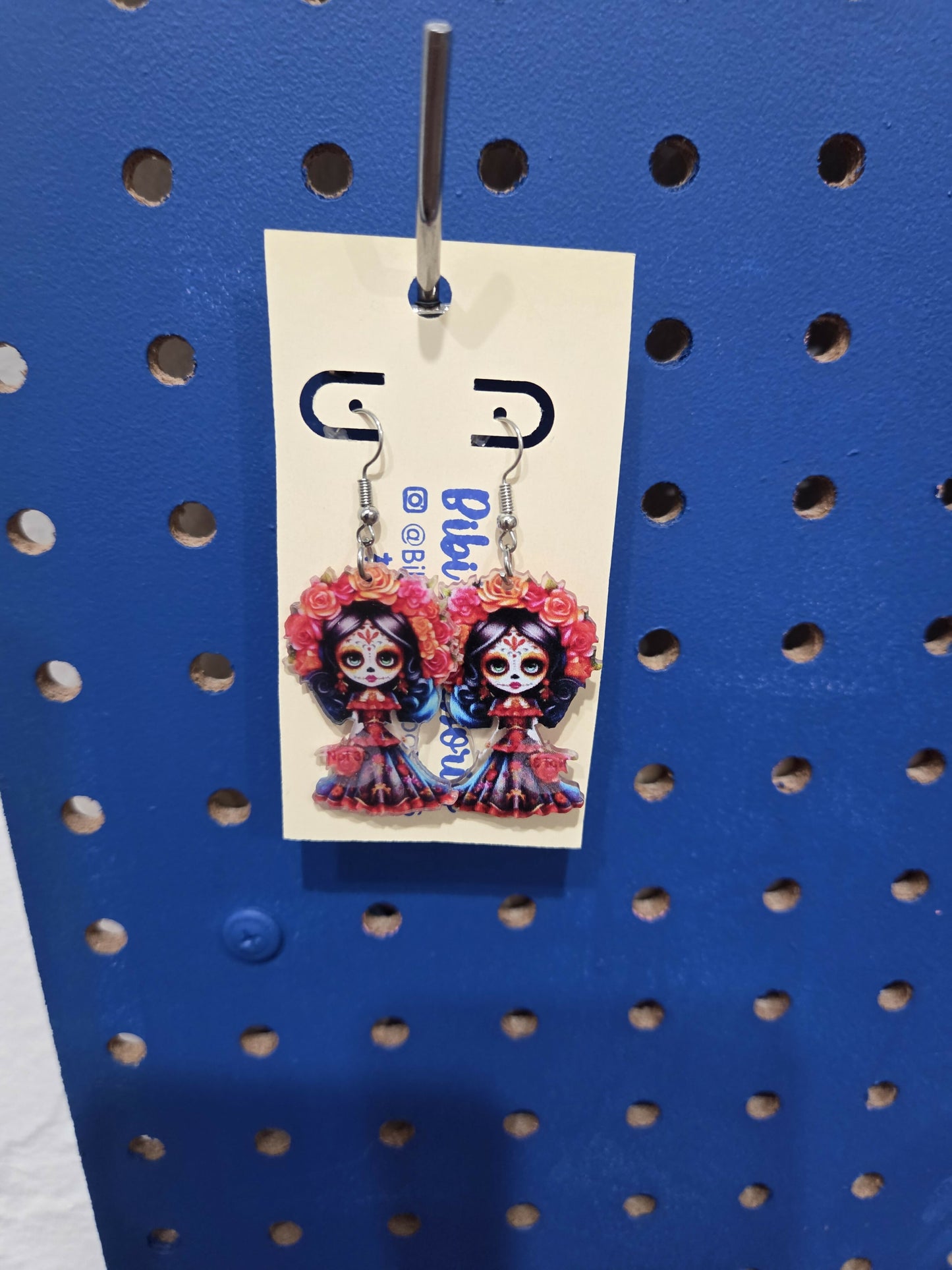 Aretes catrina resina