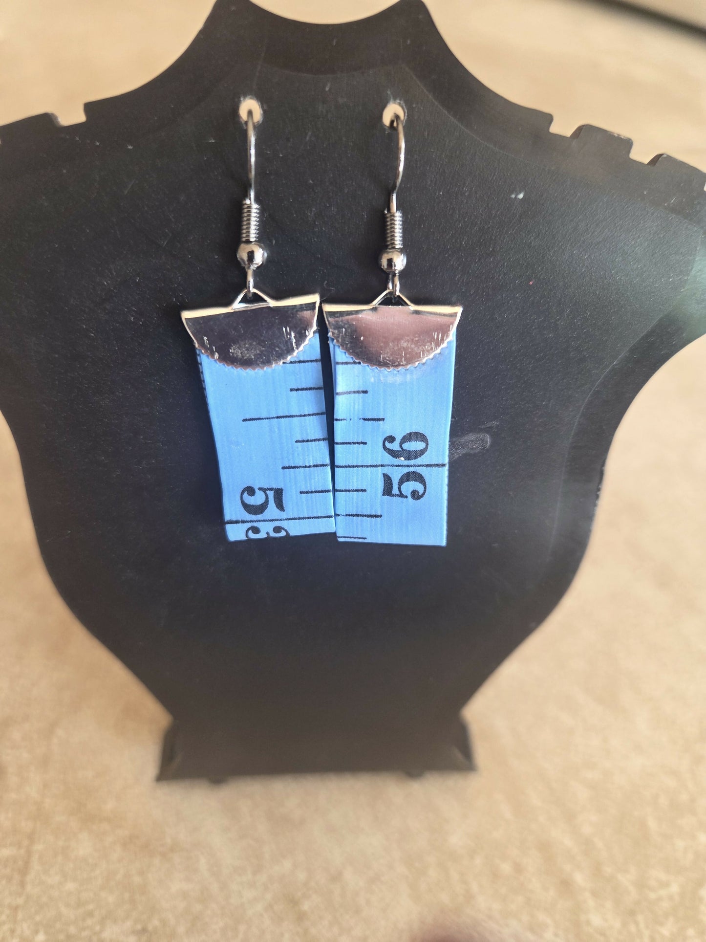 Aretes cinta metrica