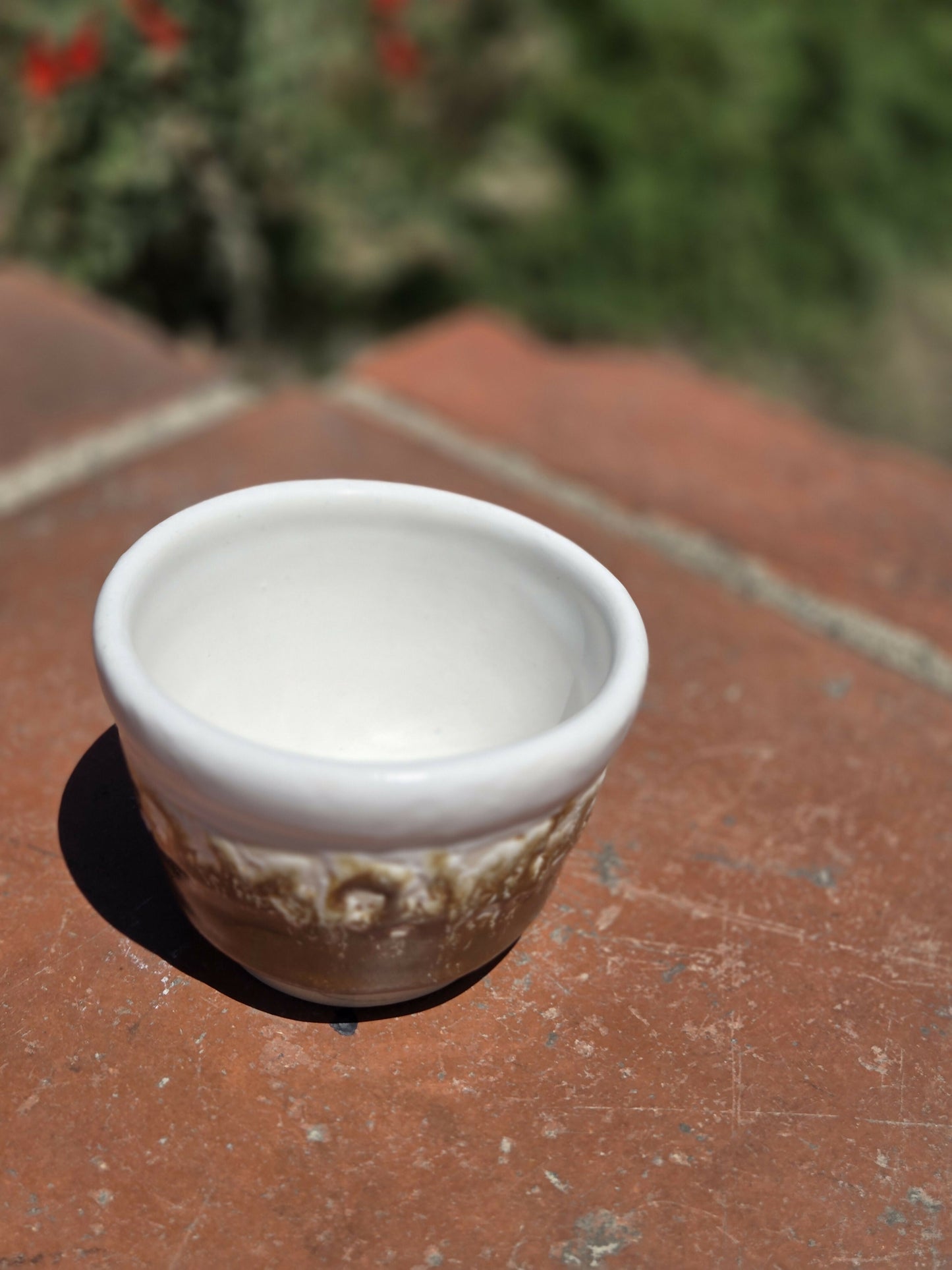Brown and White Tea cup