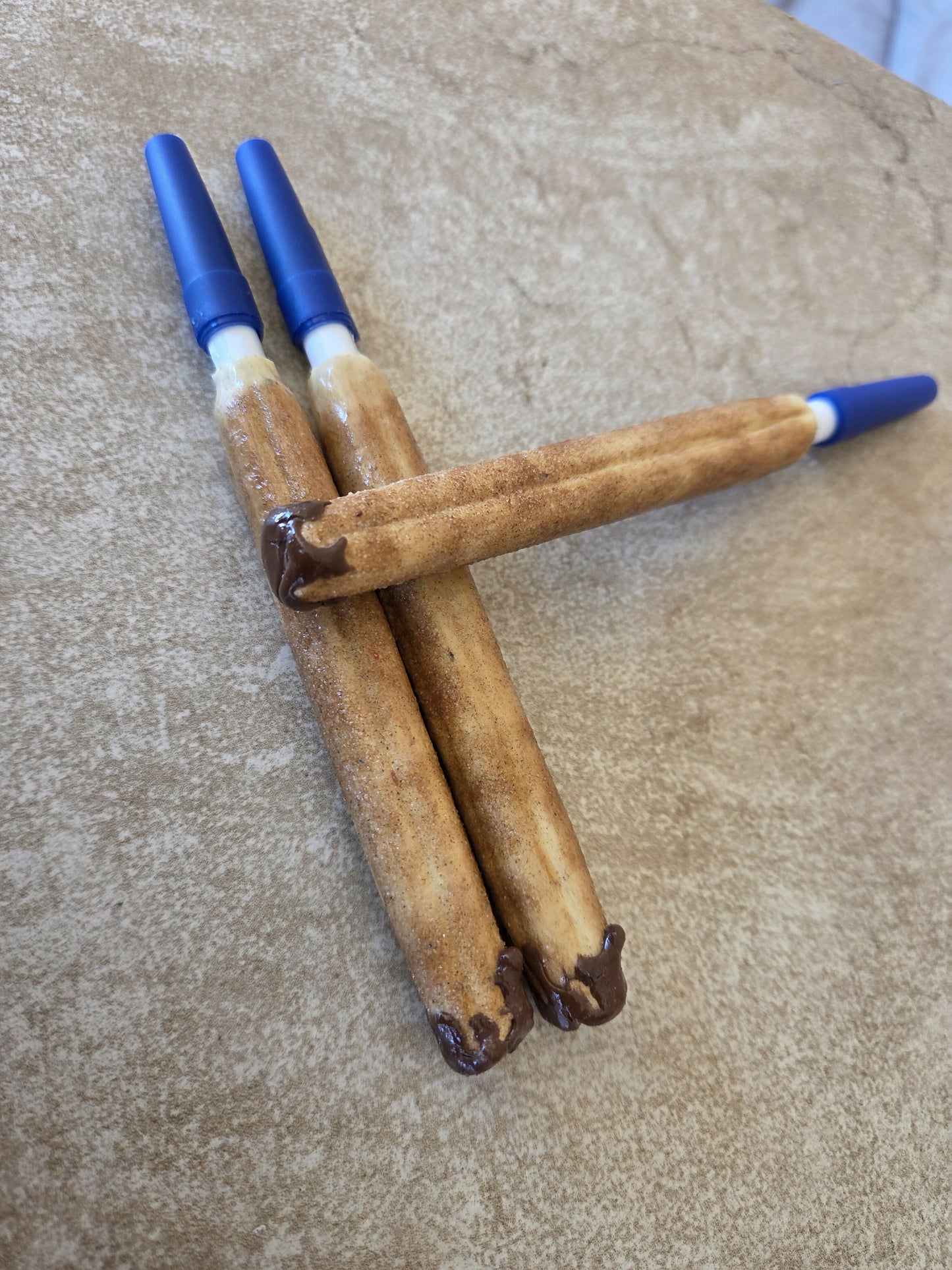 Pluma churro con Nutella