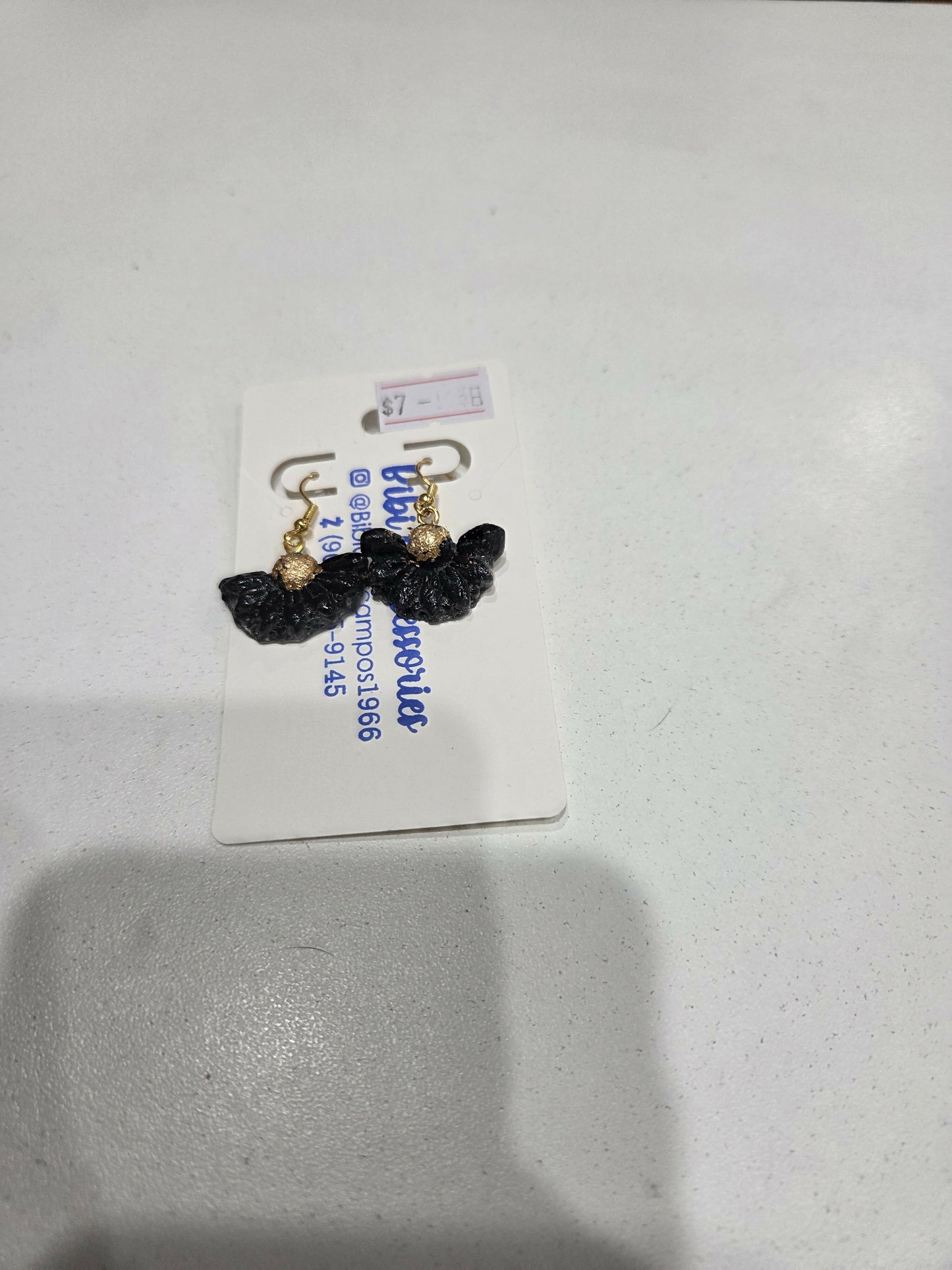 Aretes avanico negro con gold