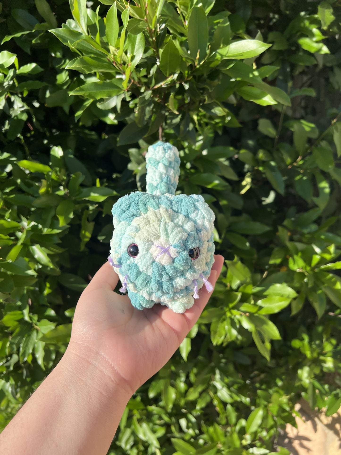 Crochet teal kitten