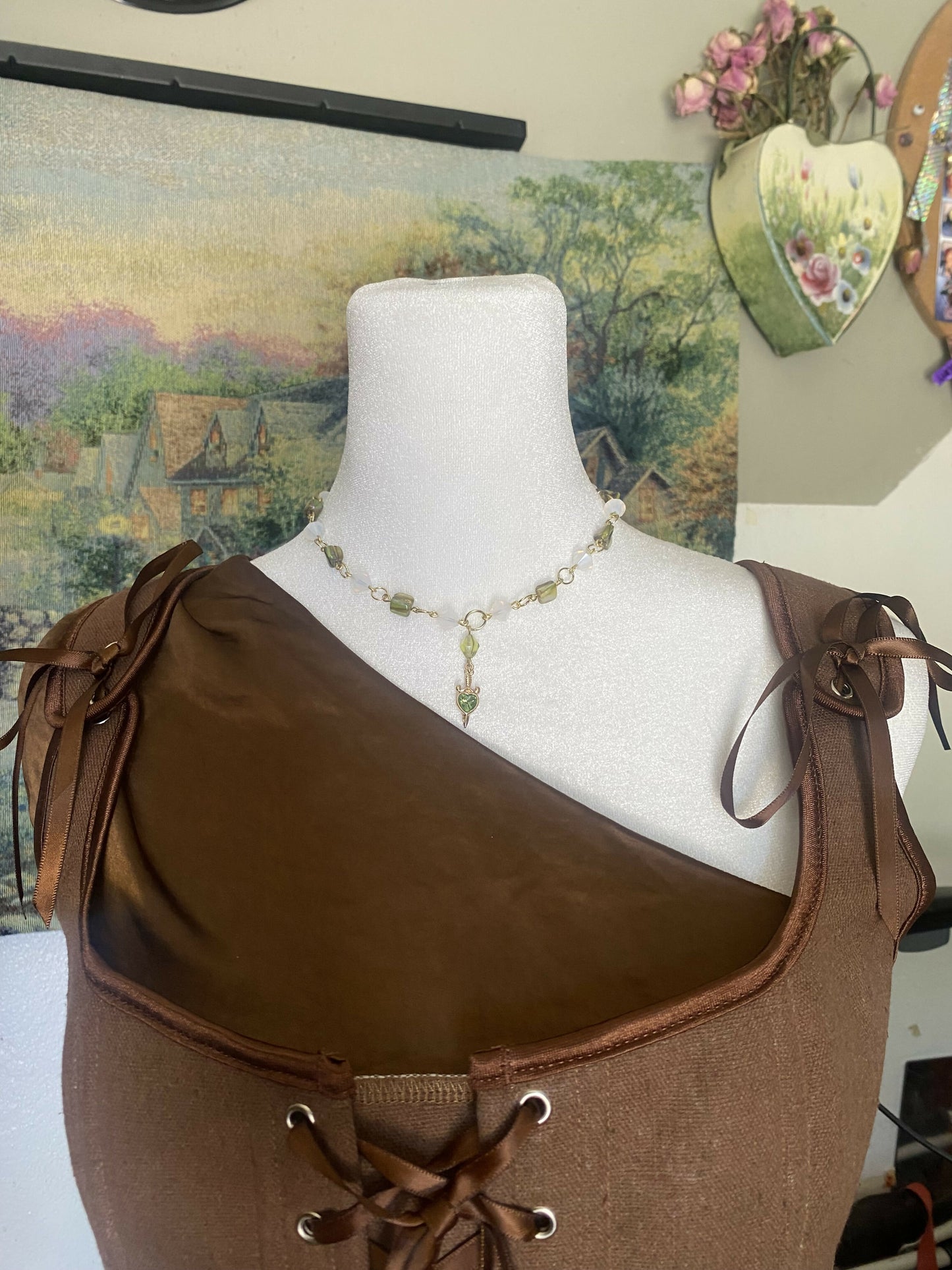 Golden green heart dagger necklace