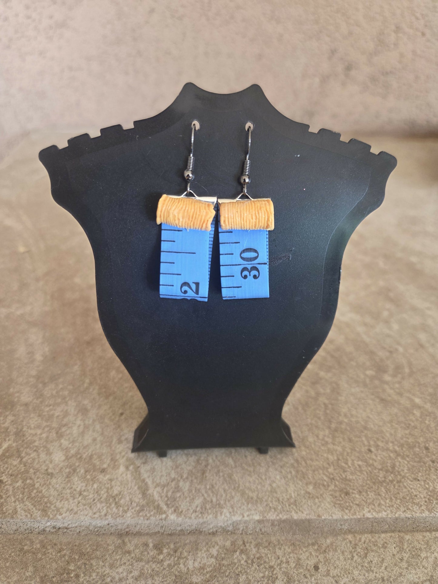 Aretes cinta metrica