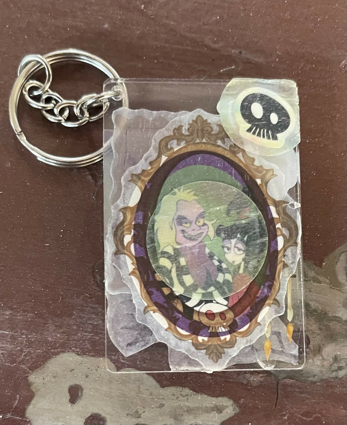 Keychains collage beetle juice Winnie baymax Alice Rosalina