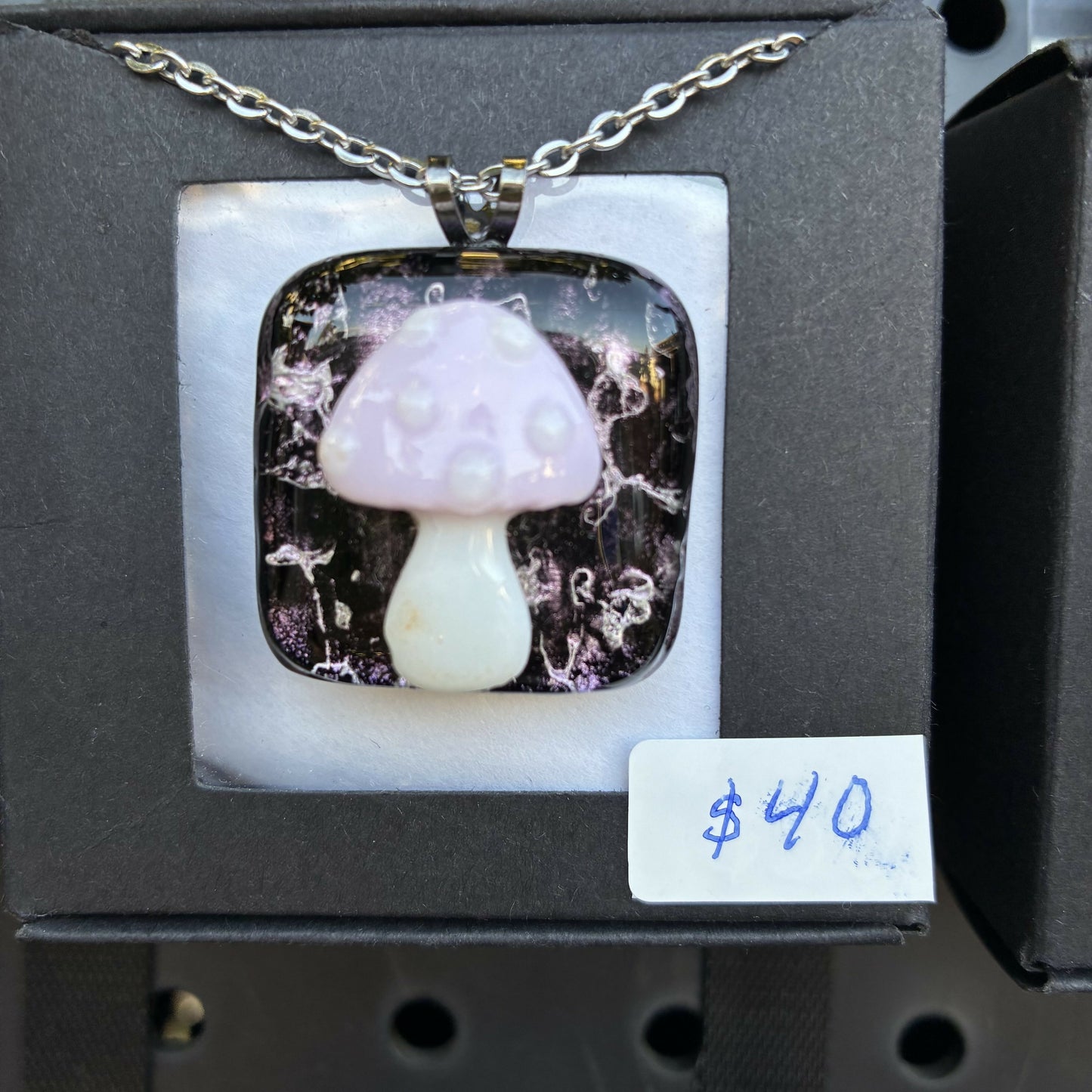 Lavender mushroom on black special glass