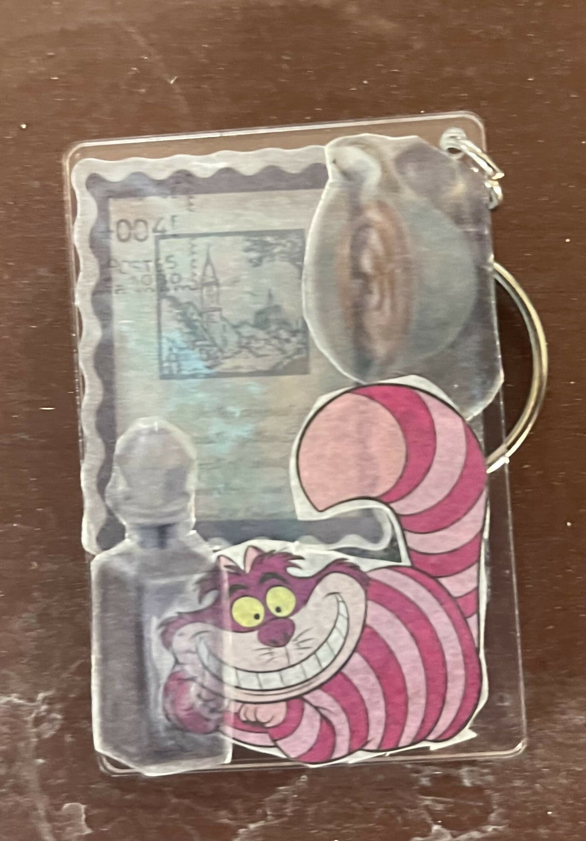 Keychains collage beetle juice Winnie baymax Alice Rosalina