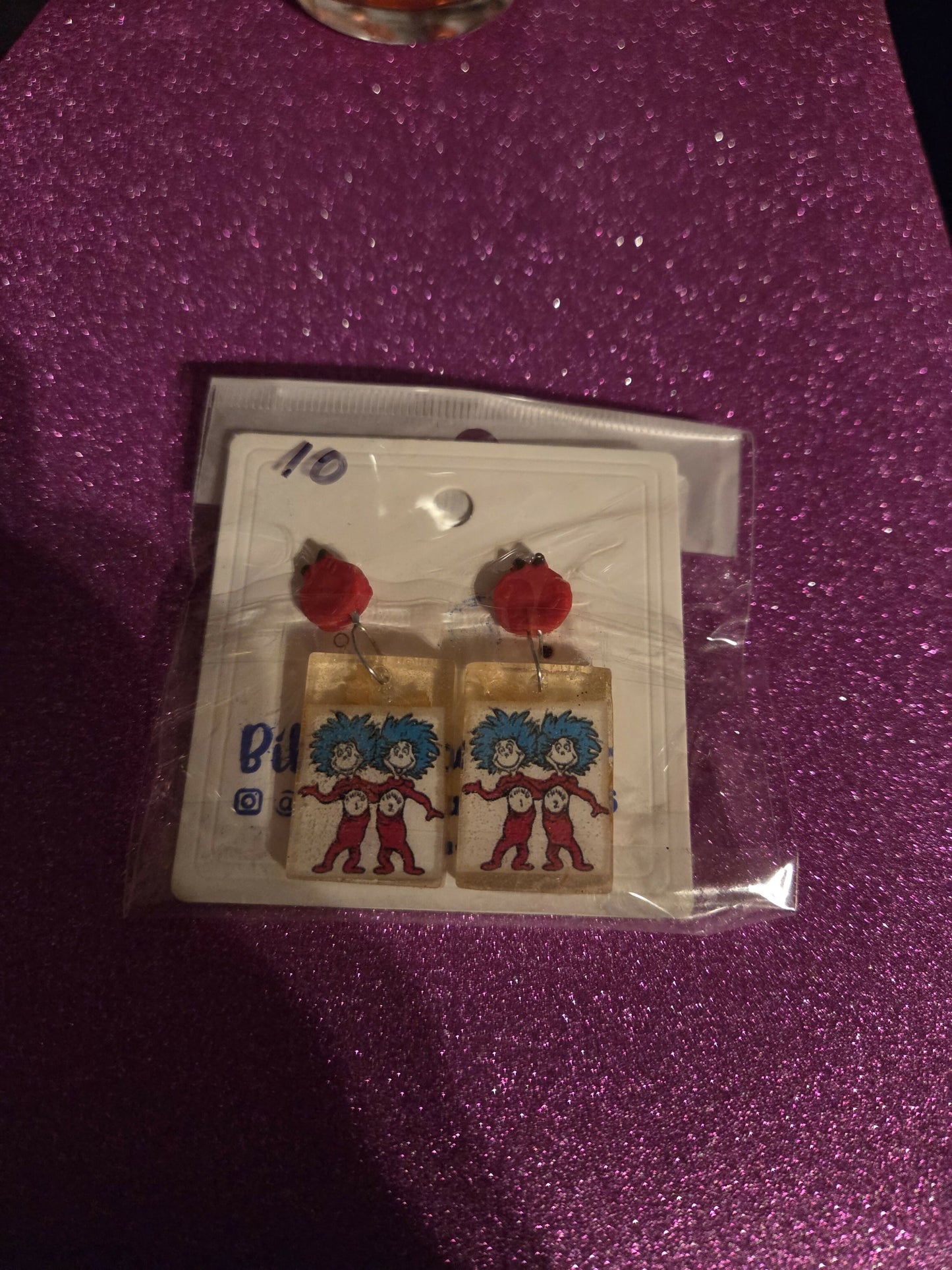 Aretes tin one two teacher resina