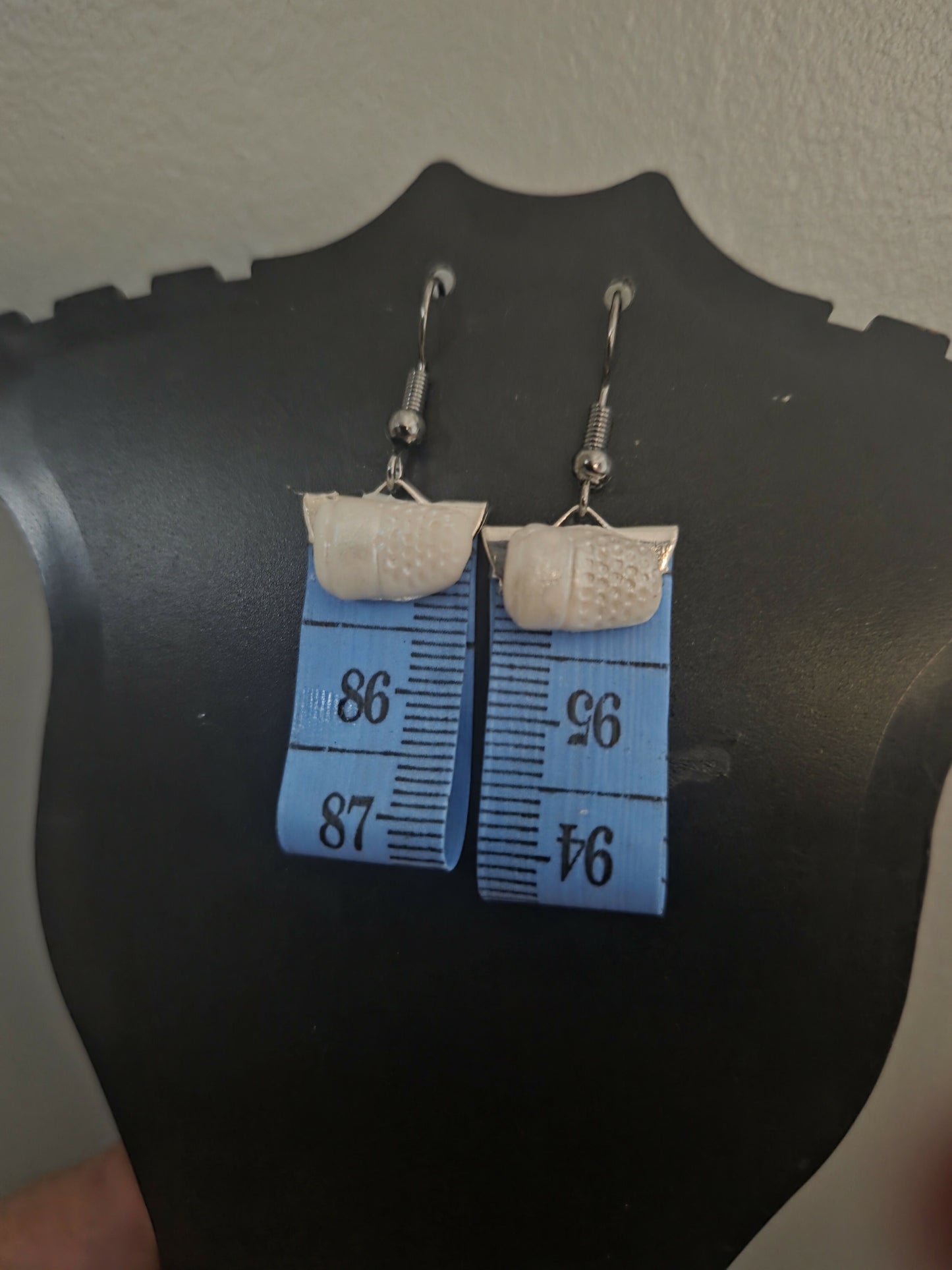 Aretes cinta metrica