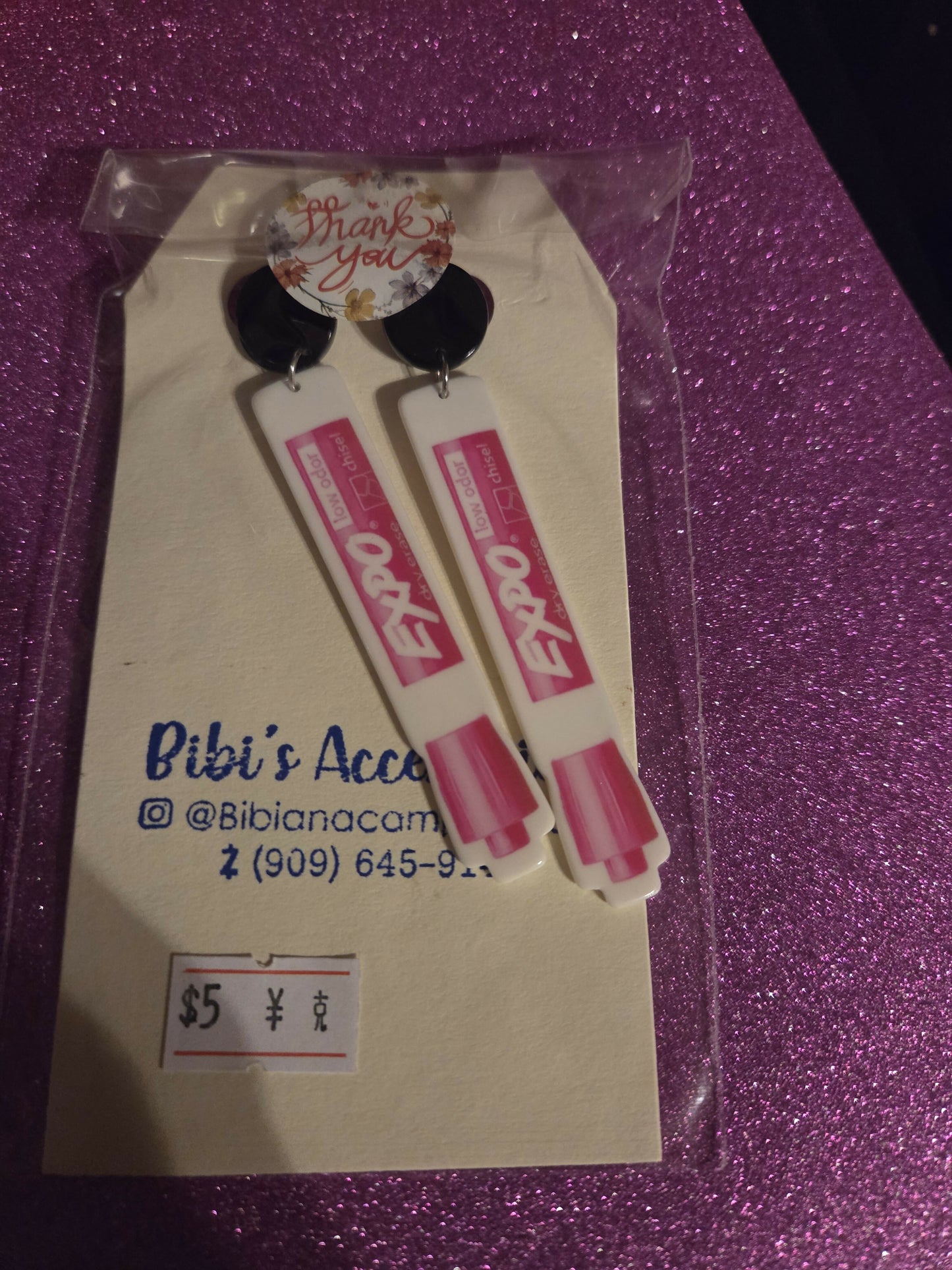 Aretes maestra marcador rosa