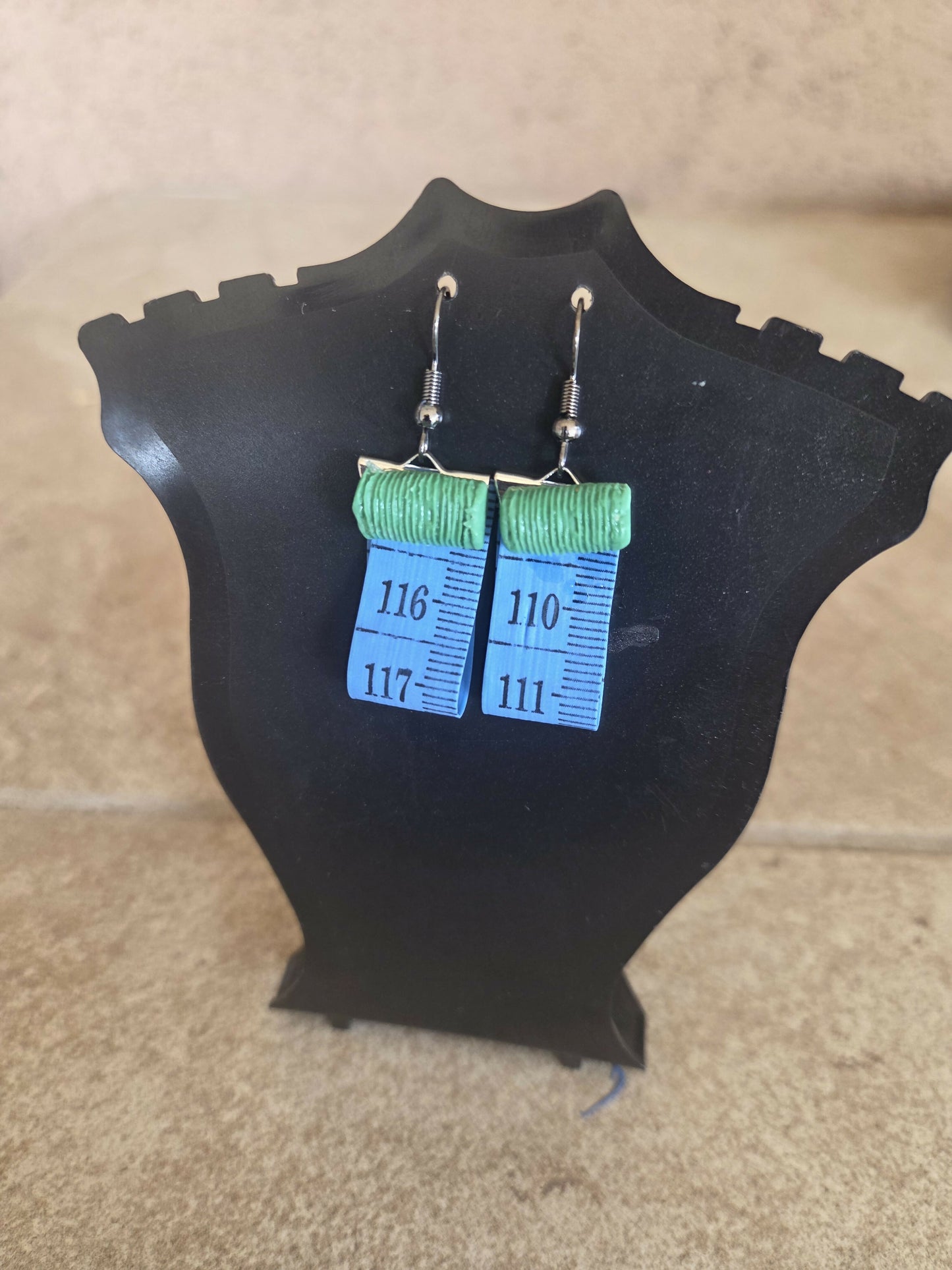 Aretes cinta metrica